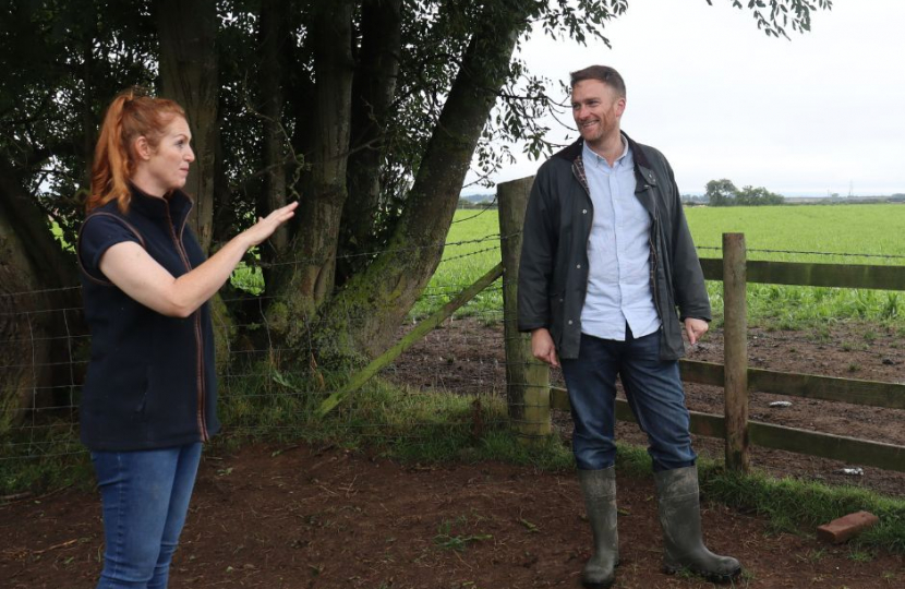 Matt Vickers MP with farm owner Clare Wise.