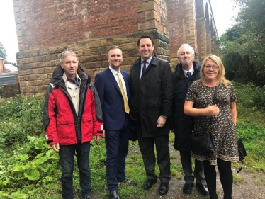 Matt Vickers and Ben Houchen at Yarm Viaduct with members of the campaign team