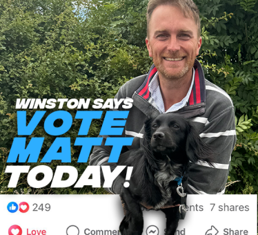 Matt with Winston a black dog on facebook