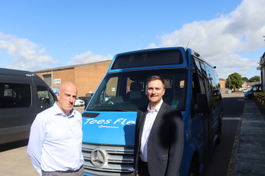 Matt Vickers MP stood by Tees Flex bus