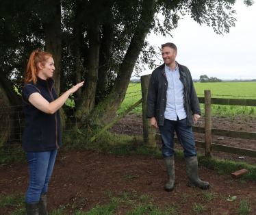 Matt Vickers MP with farm owner Clare Wise.